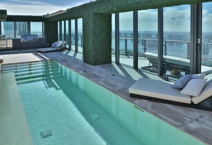 The penthouse has five bedrooms, six bathrooms, two half baths, a spa, wine cellar, movie theater and rooftop pool.